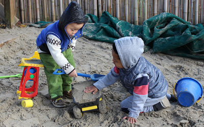 boys in sandpit at childcare
