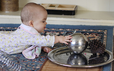 baby with ball at childcare