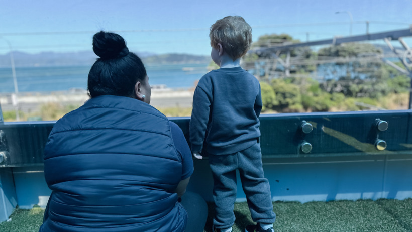 Teacher with child at Active Explorers Kaiwharawhara in Wellington