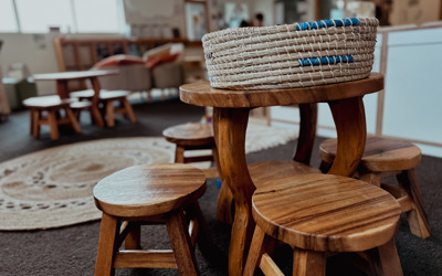 Wooden carved table and chair set for children at Active Explorers Grenada preschool in Wellington